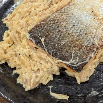 Crispy-skinned salmon over creamy orzo